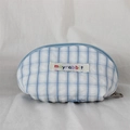 Close-up of blue gingham mini shell pouch with embroidered logo and zip closure - Blue Grid Blue Bow