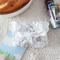 Detail of quilted cotton coin purse with blue stripes, bear prints and lace trim - Bear