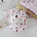 Detail of pink quilted drawstring storage bag featuring cute cartoon bear prints - Bear with Red Hat on Pink Base
