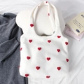 Detailed view of red heart embroidery on a white knitted tote bag with soft plush texture - Heart White