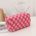 Close-up of pink checkered knit makeup bag featuring soft texture and sturdy zipper - Pink & White Plaid