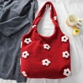 Detail of red knit tote bag with 3D white flower accents and checkered lining texture - Flower Red