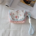 Detail of pink quilted case with floral embroidery and blue pom-pom trim for cameras - Quilted Heart Light Pink