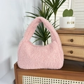 Detail of pink plush teddy tote bag on a wooden cabinet with cozy home decor background - Light Pink