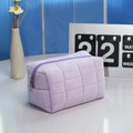Purple plush cosmetic bag with quilted checkered pattern and secure metal zipper - Purple