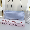 Detail of blue and white striped seersucker pencil case with sturdy zipper and metal pull - Light Blue Striped