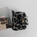 Close-up of leopard print wool coin purse with silver metal ring and gold snap button - Woolen Grey Leopard