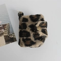 Close-up of leopard print plush coin purse with gold snap button and metal ring - Woolen Brown Leopard