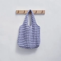 Light purple bubble textured tote bag with popcorn fabric design hanging on hook - Bubble Purple