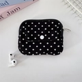 Detail of corduroy polka dot pouch featuring metal zipper ring and snap button pocket - Black Polka Dot