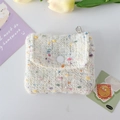 Close-up of tweed coin purse with colorful knit texture, button closure and metal ring - Flip Card Holder / White