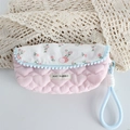 Detail of pink floral quilted pouch with soft heart texture and blue pompom trim - Crinkled Fabric Pink Heart Floral Pencil Case
