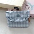 Detailed view of blue gingham ruffle mini storage pouch with snap closure and side label - Blue Plaid