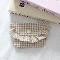 Close-up of yellow gingham mini pouch with ruffle edge and snap button closure - Khaki Plaid