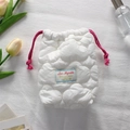 Macro detail of white quilted camera pouch with pink drawstring and soft cloud texture - Quilted Cloud Milky White
