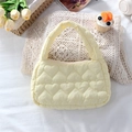 Detail view of yellow heart quilted mini tote with soft padding and zip closure - Quilted Large Heart Yellow