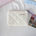 Close-up of white quilted mini coin purse with purple strap and zipper detail - Quilted Pleated Beige White