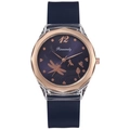 Close-up of rose gold watch bezel with dragonfly and butterfly patterns on blue dial - Blue