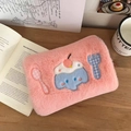 Detail of pink plush electric hot water bag with cute blue monster embroidery on table - Pink (Includes Liner)