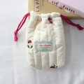 Detailed close-up of quilted camera bag with red mushroom embroidery and drawstrings - Quilted Vertical Stripe Embroidery Mushroom