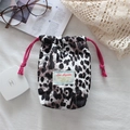 Padded leopard print drawstring camera pouch with a vibrant pink rope closure - White Leopard