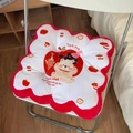 Close-up of plush cartoon flower chair cushion with thick flannel texture on a folding chair - Red Apple Seat Cushion