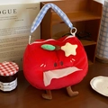 Dettaglio porta fazzoletti a forma di mela in peluche rossa con manico a quadretti e stella - Mela Stellata