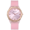 Detailed macro view of pink quartz watch with silicone strap and Roman numeric dial - Pink