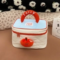 Trousse de maquillage matelassée bleue et beige avec broderie Jolly et breloque - Pomme