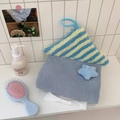 Close-up of soft plush house-shaped tissue holder with blue striped fabric details - Blue Star