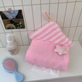 Close-up of pink waffle texture tissue bag with star plush decor and hanging rope - Pink Star
