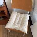 Detail of floral quilted seat cushion showing thick texture and colorful embroidery - 40*40cm / Dancing Ribbon