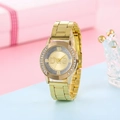 Close-up of gold quartz watch with diamond bezel on a pink gift box and crown - Model 02 Gold