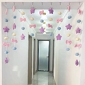 Detail of macaron plush planet door curtain with purple stars and colorful pom-poms - Purple Planet Door Curtain (9 Strings 45 Beads)