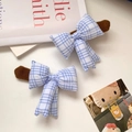 Detail of blue and white checkered bow handle cover with Weekend embroidery - Left Opening / Blue