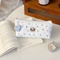 Detailed view of floral canvas pencil case with Hello Kitty patch and lace trim detail - Lace Cat + Pendant