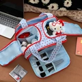 Light blue cosmetic bag with heart pattern and brush slots in a travel-ready layout - Blue Heart