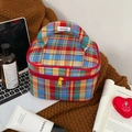 Detail of colorful plaid travel wash bag with sturdy handle and dual zipper closure - Retro Plaid Handbag