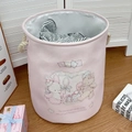 Detail of pink cartoon laundry basket with thick rope handles and soft animal graphics - Baby Bear & Rabbit