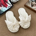 Detail of cream white platform flip flops with large silk bow decoration and soft sole - S (36/37) / Black (Silk Bow)