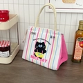 Detailed view of insulated canvas lunch bag with cartoon cat and colorful stripes - Suspenders Cat