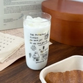 Detail view of transparent glass cup with artistic hand-drawn sketches and cold beverage - 400ml / Retro Line Graffiti Style