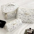 Quilted fabric cosmetic bag set with hand-drawn cartoon patterns and ribbon zipper pulls - Vibrant Garden