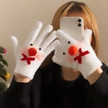 Detail of plush snowman gloves with soft faux mink texture and red ribbon bow for Christmas - Snowman
