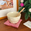 Star pattern ceramic bowl with wooden spoon on a rustic wooden table setting - Pink and Blue Stars