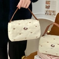 Beauty case trapuntato bianco con patch Hello Kitty e manici in pelle marrone - Ciambella al Tè al Latte