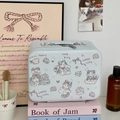 Detail of cute cat-themed makeup organizer with double metal zippers and top handle - Cake Cat