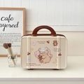 Detail of cute cream makeup box with dog illustrations and brown handle in home setting - Goodnight Bear