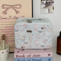 Chic blue Hello Kitty makeup case with large capacity and cartoon prints on books - Dessert Cat