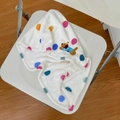 Detail of soft coral fleece hooded towel with colorful polka dots and dog embroidery - Spotted Dog Hair Drying Cap / White